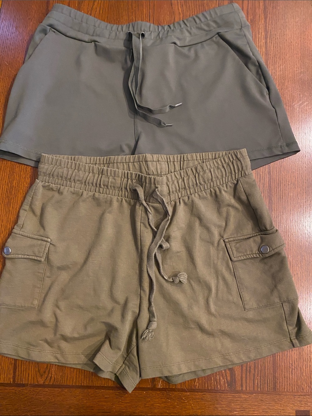 2 pairs of green shorts